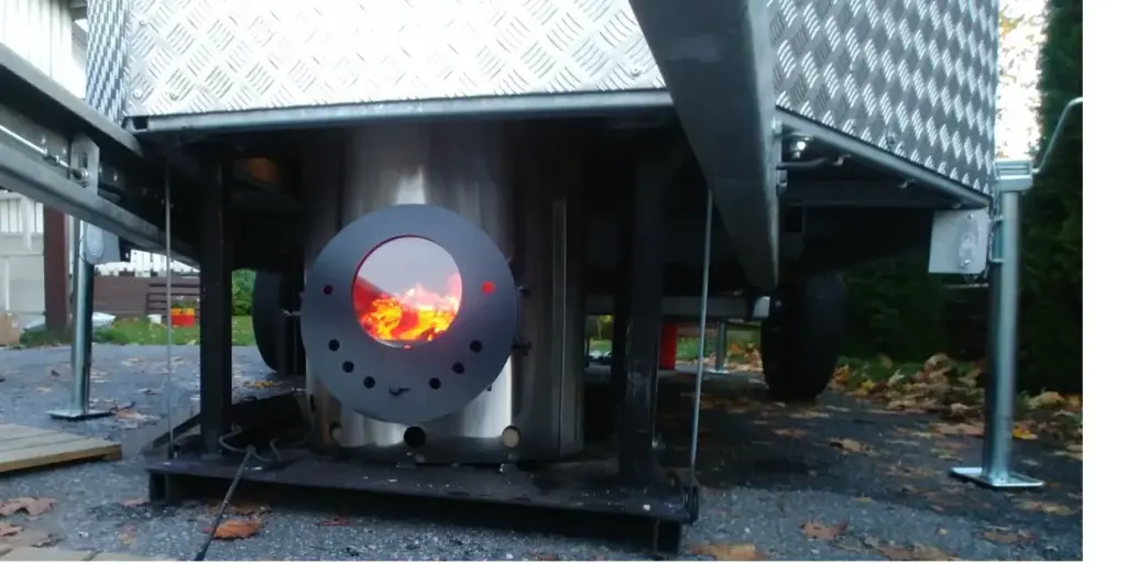 Saunavaunun uunin sytytys ulkoa käsin